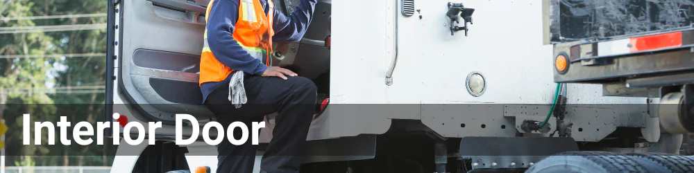 An individual is stepping into the cab of a tractor trailer. The header is Interior Door in a white font.